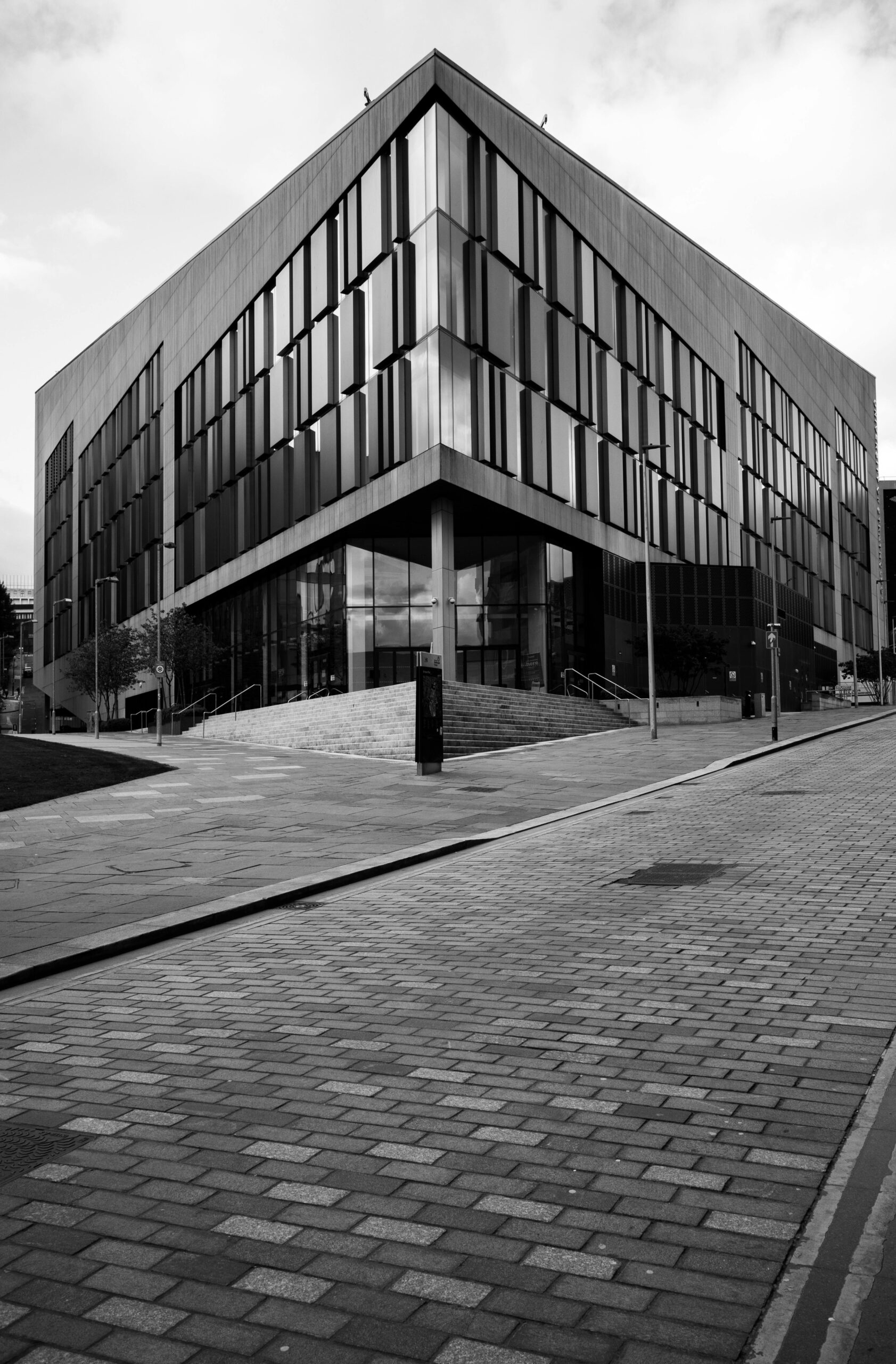 Low angle shot of modern university building in monochrome, Glasgow.